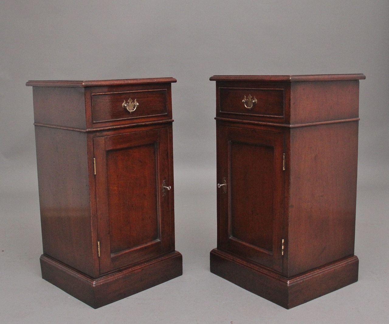 A Pair Of Mahogany Bedside Cabinets